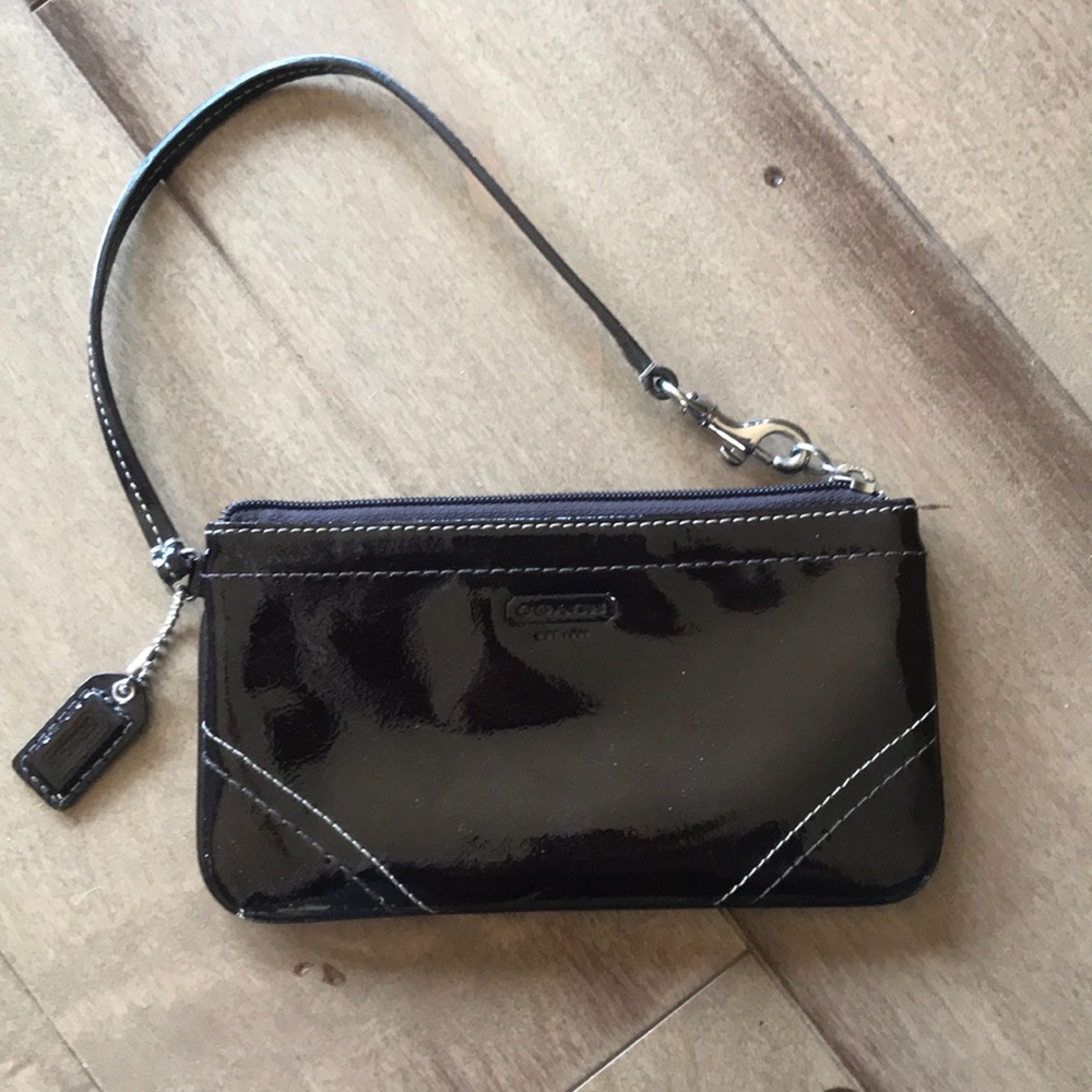 Coach brown patten leather wristlet.